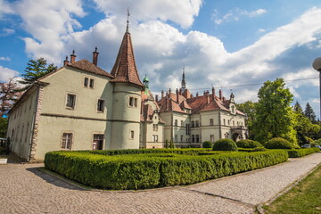 Hunting castle of Count Shenborn in Carpaty Village Chinadiyevo. Hunting Shenborn Palace built 1890-1895 on a warm summer day.. Zakarpattja Transcarpathion Region, Ukraine