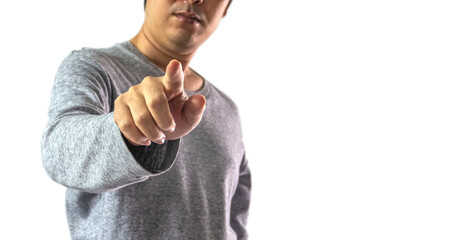 Asian man pointing at camera against white background