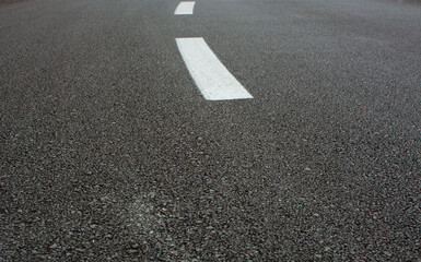 empty asphalt road and white road line.surface to write.
