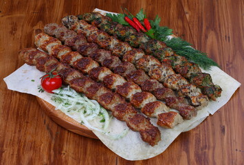 Assorted lulekebab on wooden background