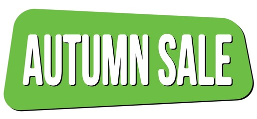 AUTUMN SALE text on green trapeze stamp sign.