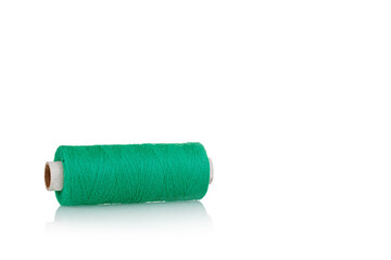 skein of thread green colors macro on a white background