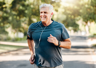 Senior man running while listening to music outdoor street and park for fitness, wellness or...