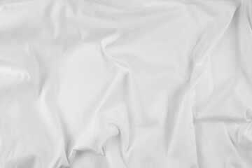 Obraz premium White fabric. luxurious white fabric texture background. Creases of satin, silk, and cotton.