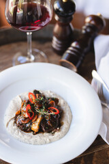 Stylish serving of food in the restaurant. Serving. Waiter