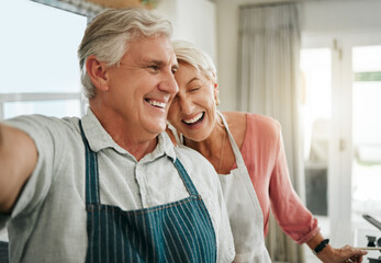 Elderly, couple and selfie in home happy while cooking, baking or cleaning together in funny moment. Older man, woman and retirement laughing in kitchen, bonding and smile, to make food and joke