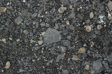 background gray asphalt crumbs of different sizes.