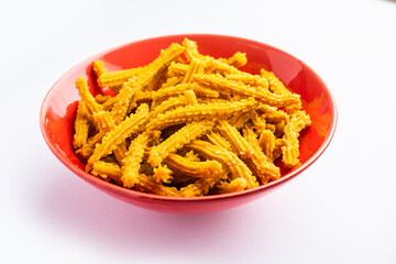 Bhajni chakli sticks or crunchy murukku snack made using diwali festival, favourite munching food