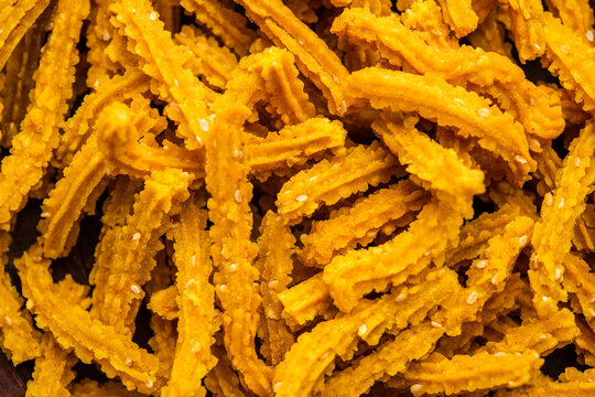 Bhajni chakli sticks or crunchy murukku snack made using diwali festival, favourite munching food