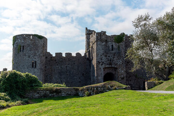 Manorbier Castle in Pembrokeshire south Wales UK which is an 11th century Norman fort ruin and a popular travel destination tourist attraction landmark, stock photo image