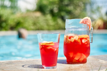 fruit cocktails by the pool