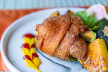 Deep Fried Pork Knuckle dish in restaurant