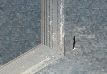 A woman rollerskating in the city