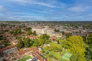 Fototapeta na wymiar The drone aerial view of Winchester Cathedral and city, England. The Cathedral Church of the Holy Trinity, Saint Peter, Saint Paul and Saint Swithun, commonly known as Winchester Cathedral.