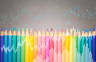 Pastel color pencil with business graphs and charts, Candle stick graph chart of stock market investment trading, Statistic and data, charts diagrams, Financial and economy concept.