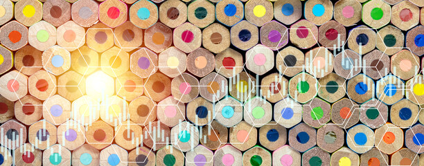 Pattern of stacked crayons with business candle stick graph chart of stock market investment trading, Statistic and data, charts diagrams, Financial and economy concept.