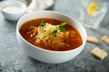 Traditional sauerkraut soup with fresh parsley