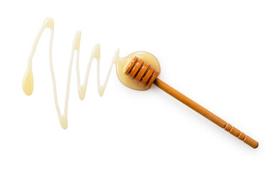 Wooden honey dipper with honey on white background.