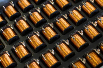 Close up on industrial coils made of copper.