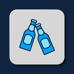 Filled outline Beer bottle icon isolated on blue background. Vector