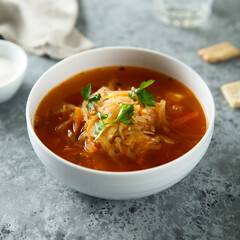 Traditional sauerkraut soup with fresh parsley