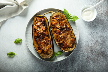 Stuffed roasted eggplant with meat and cheese