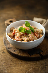 Healthy quinoa bowl with shrimps and basil