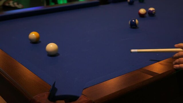 Blue-clothed pool table used for billiard game 