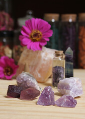 Amethyst Crystals With Flowers and Incense Cones on Meditation Table