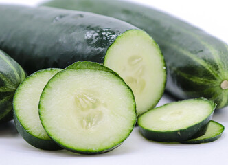 cut cucumber isolated on white background
