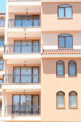 Fototapeta na wymiar Exterior of beautiful residential building with balconies