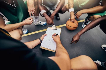 Zelfklevend Fotobehang Basketball, strategy and team with a sports coach talking to a team while planning tactics on a clipboard and hands. Teamwork, fitness and exercise with a player and teammates listening at training © Clement Coetzee/peopleimages.com