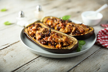 Stuffed roasted eggplant with meat and cheese