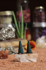 Chakra Stones With Aloe Vera and Incense Cones on Australian Red Sand