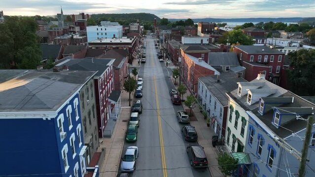 Historic architecture in USA. Small town in America. Reverse aerial at sunrise.