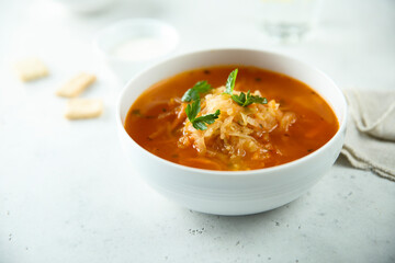Traditional sauerkraut soup with fresh parsley