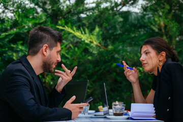 An attractive business couple having a conversation