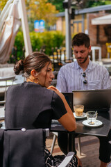Worried businessman and businesswoman cannot solve the problem about the project