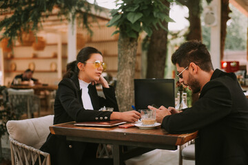 Business partners at the cafe