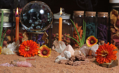 Crystal Ball With Candles and Chakra Stones on Australian Red Sand