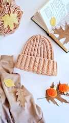 Fashionable knitted hats autumn-winter. The hat lies on a white background. Product layout. Buy a hat. Knitting. Hobby.