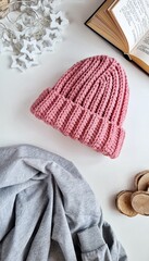 Fashionable knitted hats autumn-winter. The hat lies on a white background. Product layout. Buy a hat. Knitting. Hobby.