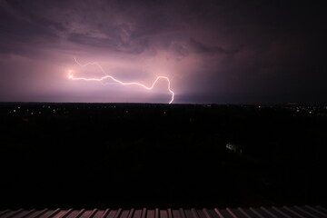 Evening photo from the window of a very beautiful lightning