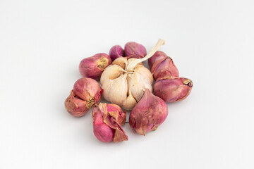 raw garlic and shallot isolated on white background