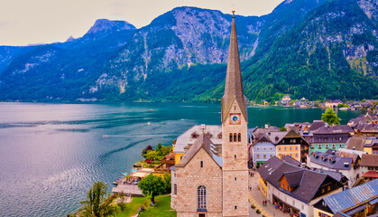 Close up ov Hallstatt Lutheran Church in Beautiful mountain village Hallstatt in the Austrian Alps, Salzkammergut region, Hallstatt, Austria. Aerial drone view.