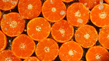 Freeze Motion Shot of Splashing Fresh Tangerines, Close-up.