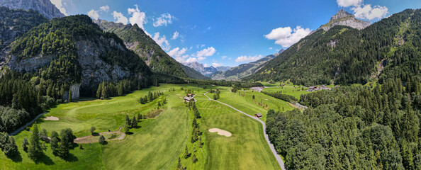 Drone view at the golf course of Engelberg in the Swiss alps © fotoember