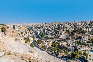 A view from the Temple of Hercules down the citadel towards the Roman Ampitheatre in Amman, Jordan in summertime