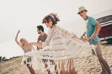 Photo of carefree best fellows ladies guys dance sand ocean seaside outdoors drive minivan fresh air weekend
