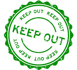 Grunge green keep out word round rubber seal stamp on white background